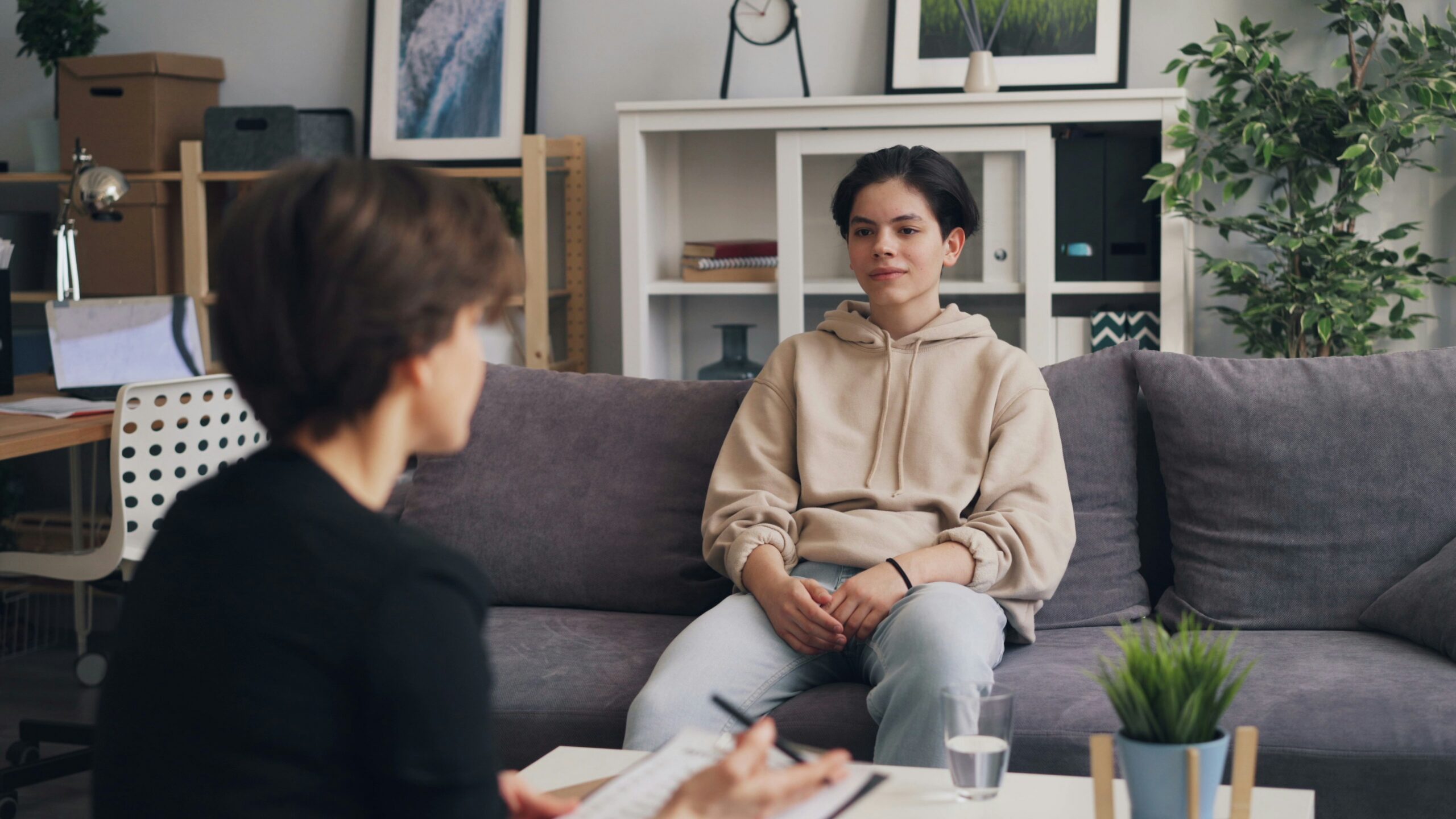 Adult and teenager speaking